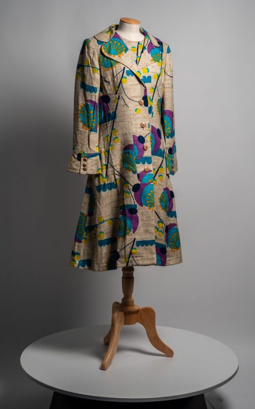 Dress & coat 1969-70. Matching cotton trical, beige fleck with abstract design in green, turquoise, orange, purple. Museum Ref: 1995/401